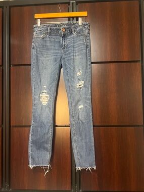 White House Black Market Distressed Blue Skinny Jeans